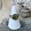 Thumbnail: Silver ring with green gemstone stone on white display stand