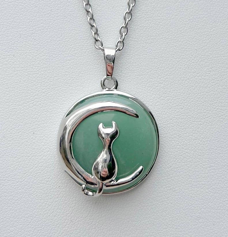 Thumbnail: Silver cat pendant necklace on green moon, everyday style fashion accessory.