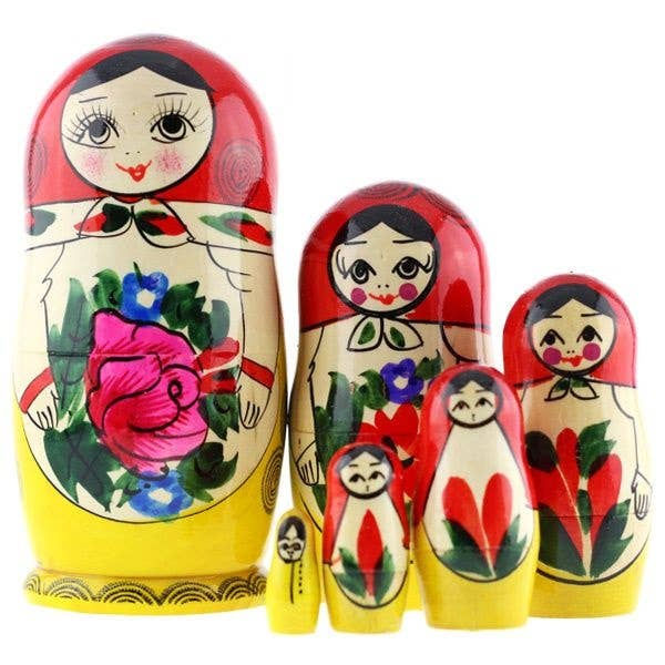 Matryoshka dolls, colorful and traditional nested dolls, on white background, Russian culture.
