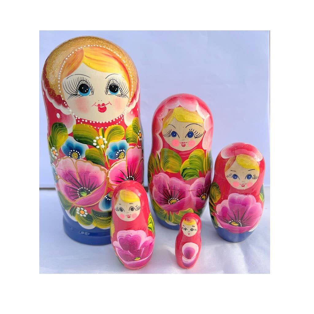Vibrant nesting dolls set, LARGE BLUE Floral Nesting Dolls Set, 7 pcs/9", displayed on white surface.