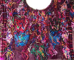 Underside of cotton and silk yarns brocaded into a Chichicastenango 'huipil'