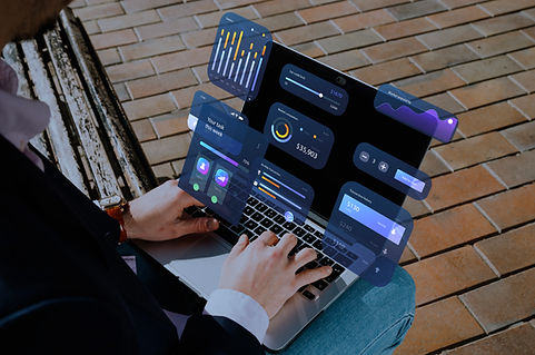 Person using laptop showcasing user interface with data and charts