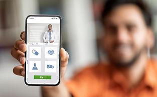 Man holding phone with doctor photo. Online medical app and healthcare services.