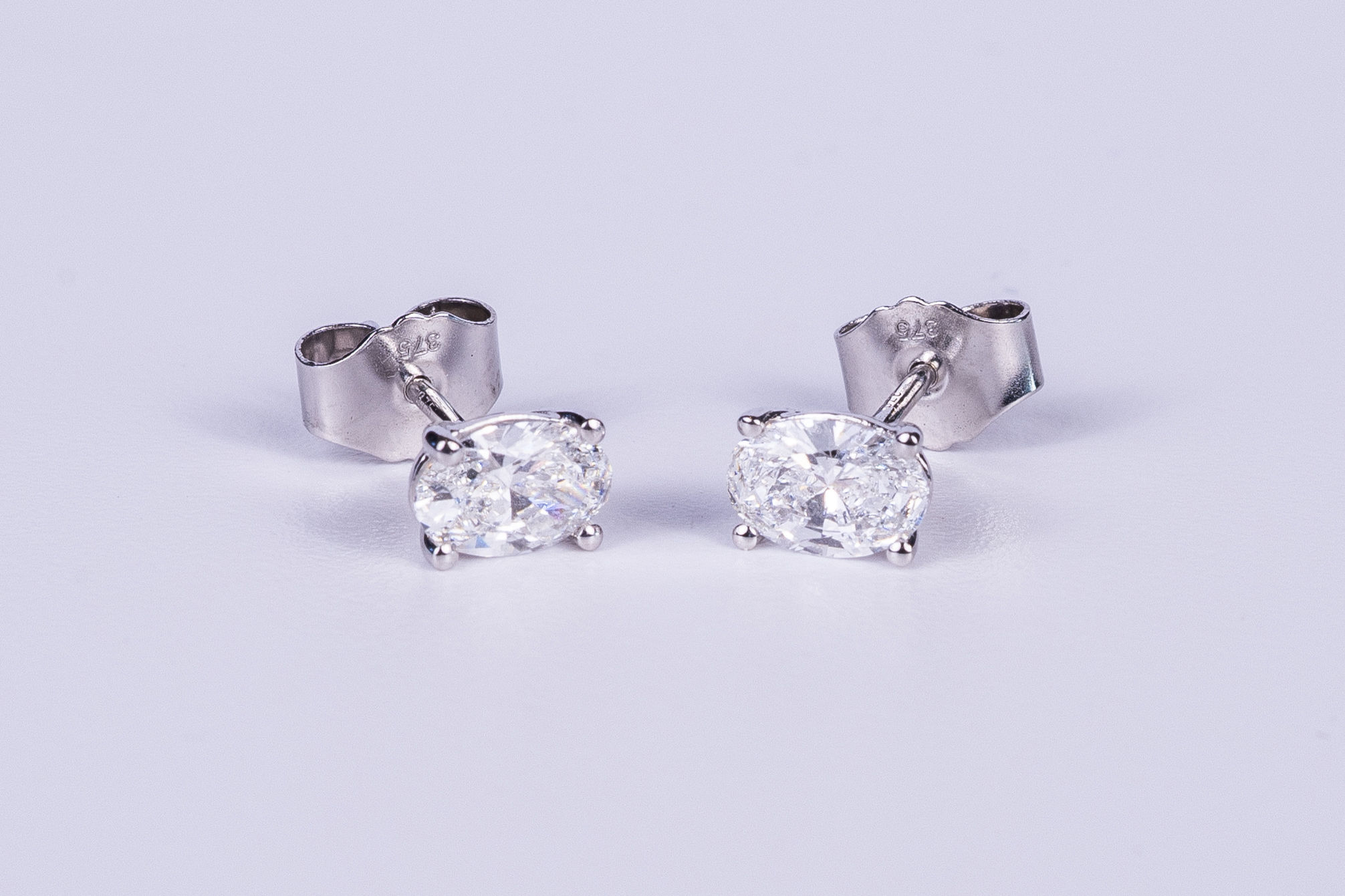 9k White Gold 1.04ct Oval Diamond Earrings (Uncertified)