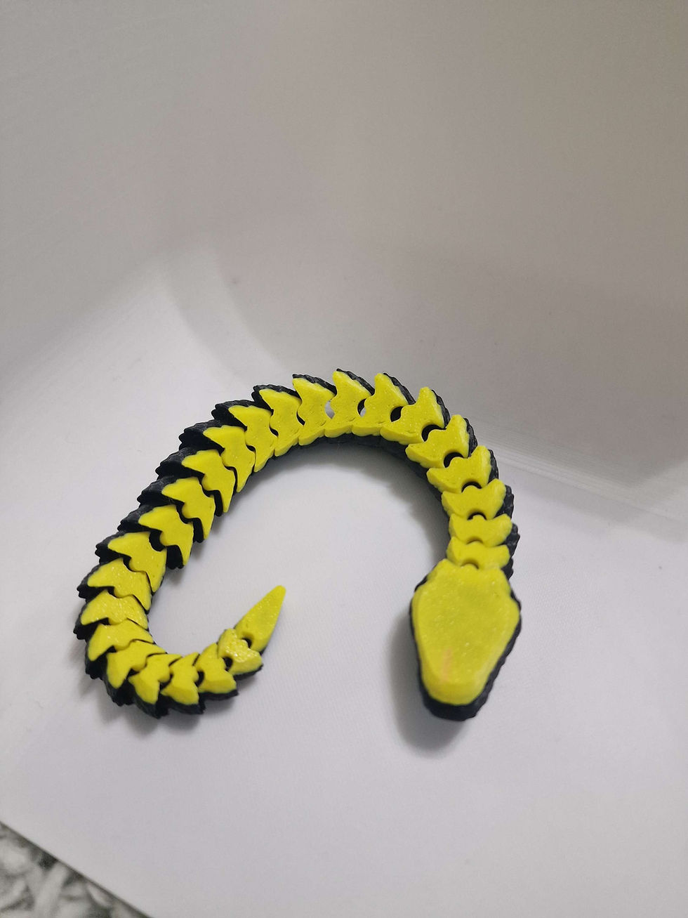 Thumbnail: Black and yellow McGybeer Fidget Snake