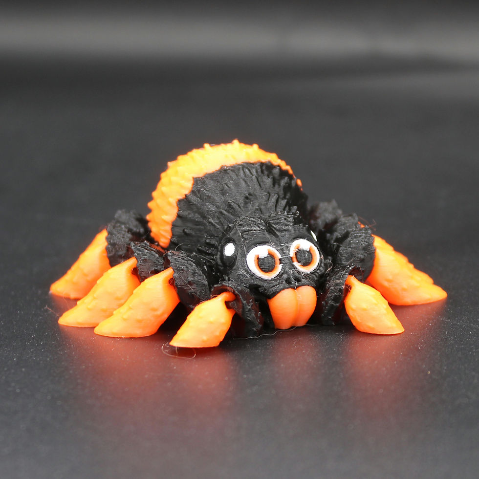 Thumbnail: Pink or Orange and black articulated fidget tarantula spider toy