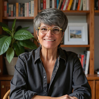Picture of Twink Jan 55 + years old, smiling, round glasses, office backdrop