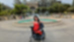 Jessica with her arms out waving at the Golden Gate Park inSan Francisco