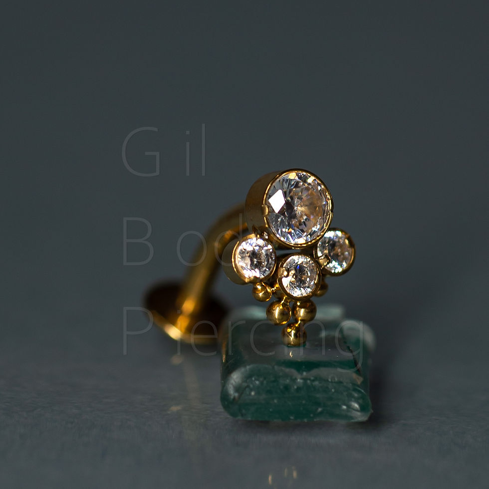 Miniatura: umbigo floating dourado 010