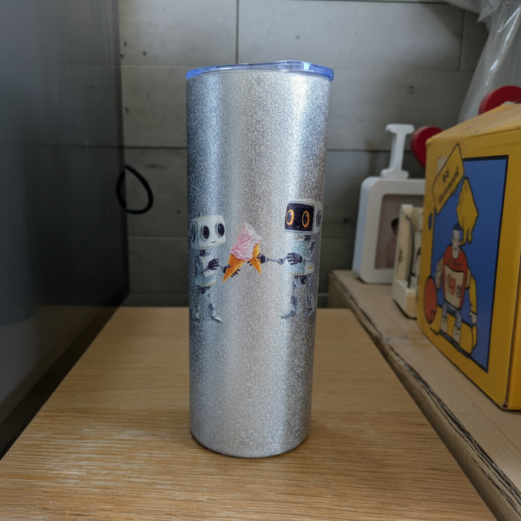 כוס בקבוק מנירוסטה בצבע כסף מנצנץ ומחוספס