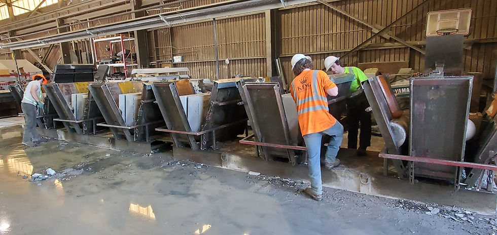 King Materials team manufacturing Redi-Rock precast concrete retaining wall blocks