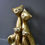 Thumbnail: Family of brass cats