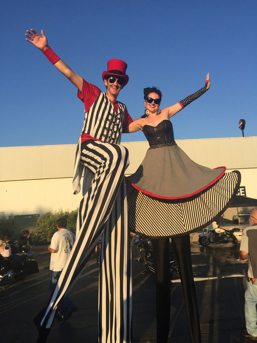stilt walking circus showgirls, contortionist, fan dancer. Pickup-stix Pick Up Stix professional insured stilt walkers for parties and events in Cleveland Ohio. Stinger Harley Davidson. Medina