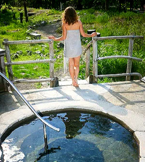 Person stepping out the spiral tubs area