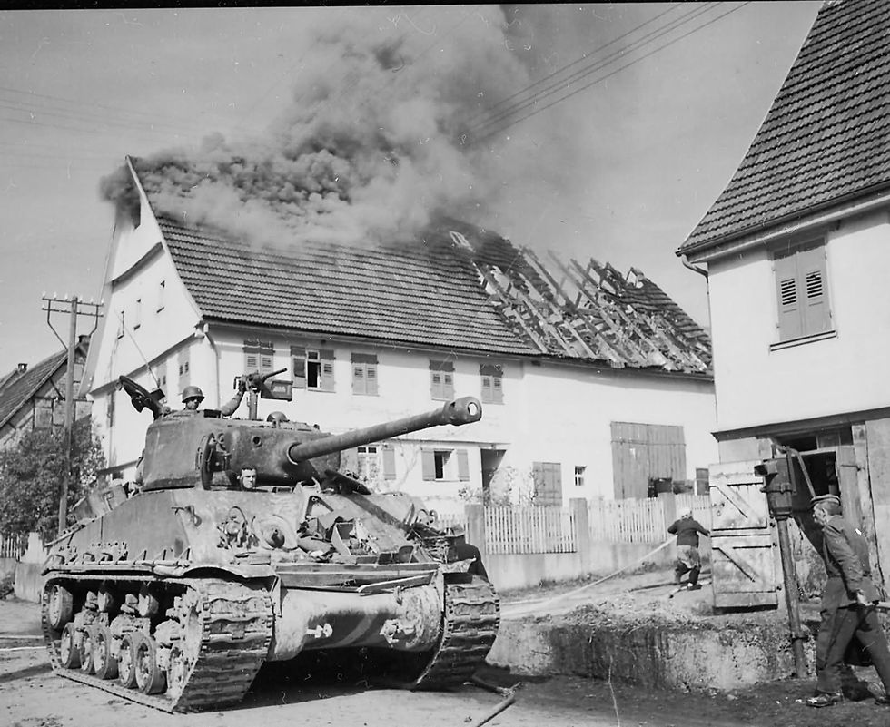 M4A3E8_Sherman_HVSS_with_76mm_gun_10th_Armored_Division_Rosswalden_Germany_1945.jpg