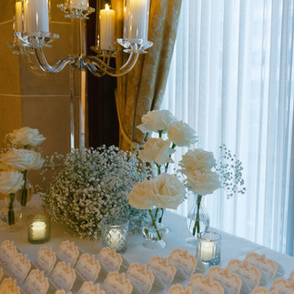 Close up of table card setup and baby's breath flowers