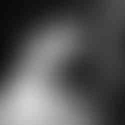 Couple enjoys a champagne tower at their reception