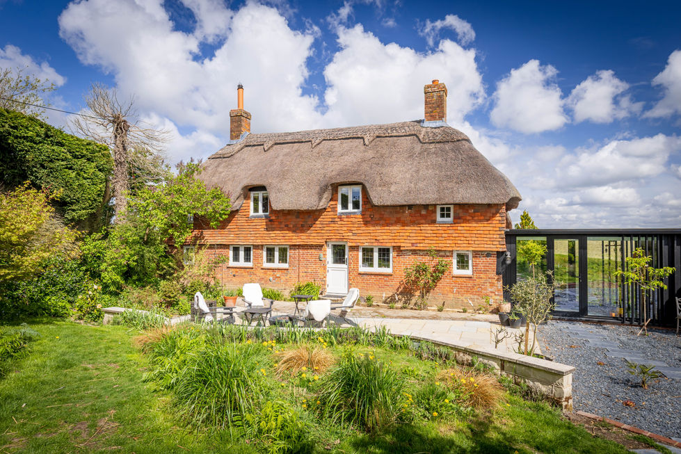 English country cottage with thatched roof