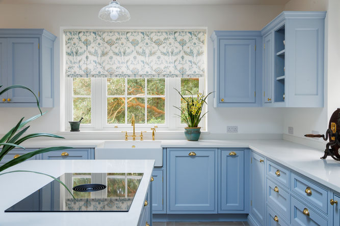 Bespoke blue kitchen cabinetry with traditional styling in West Sussex kitchen