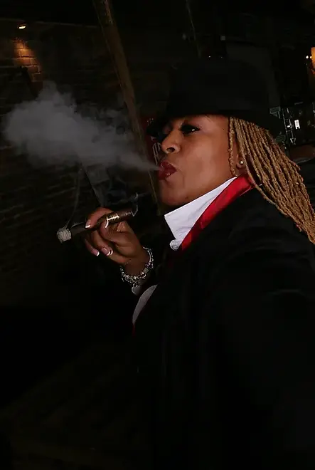 A Philly Member enjoying a cigar.jpg.webp