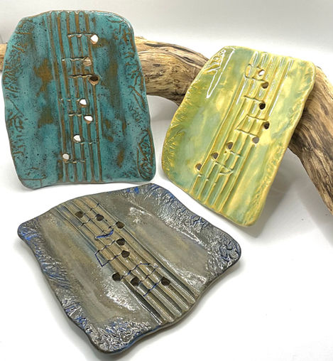 Ceramic soap dishes, music-themed