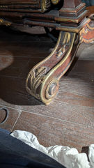Mirror wooden foot after patch and paint repair.