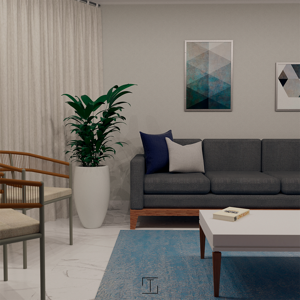 Visualização de uma sala com sofá cinza, mesa de centro branca e tapete azul com alguns quadros na parede