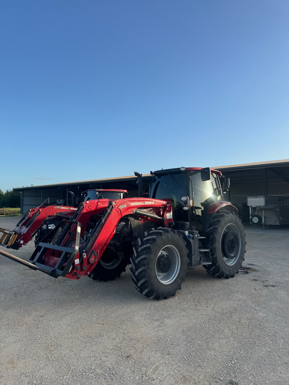 Case IH 150 tractor with tinted windows.