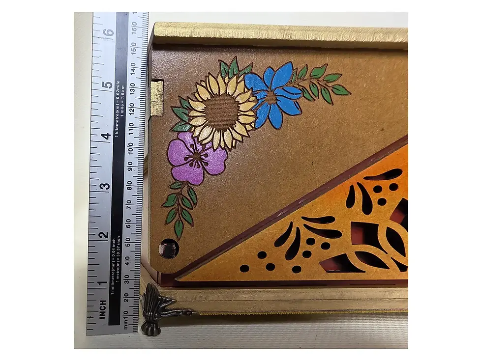Thumbnail: Side detail of the floral wooden sewing box shown beside a ruler to demonstrate its height.