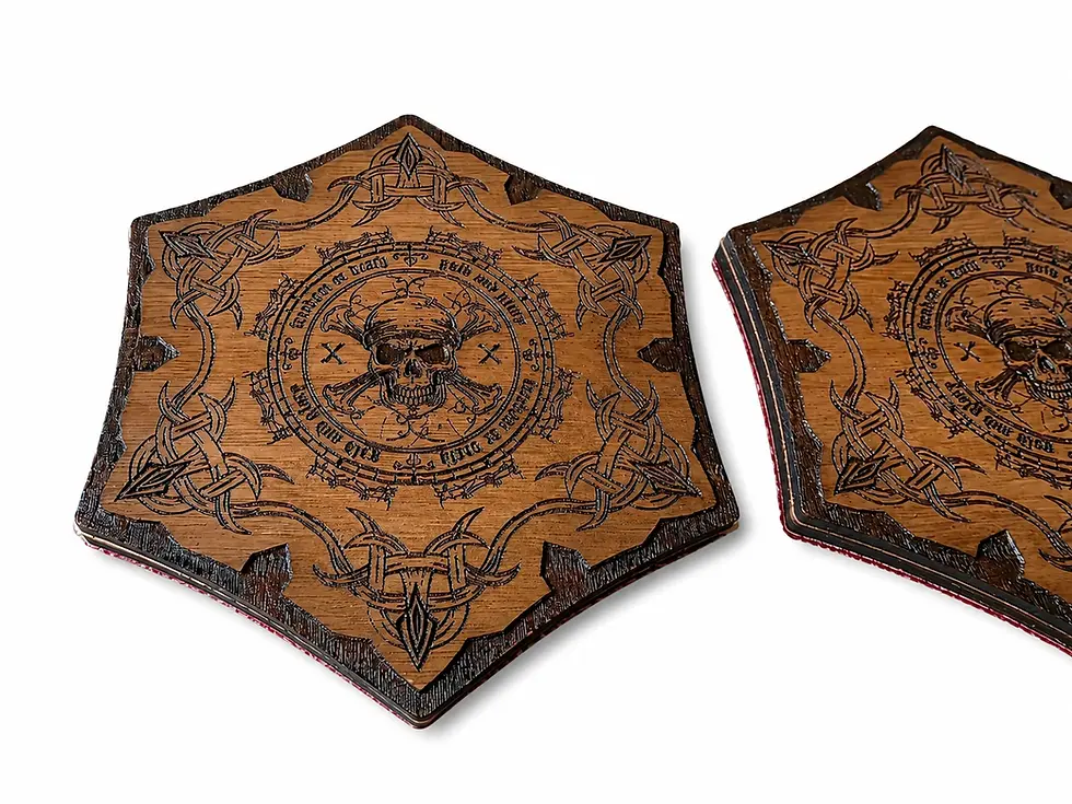 Thumbnail: Close-up of engraved wooden pirate coasters with skull and Celtic knotwork design on a white background