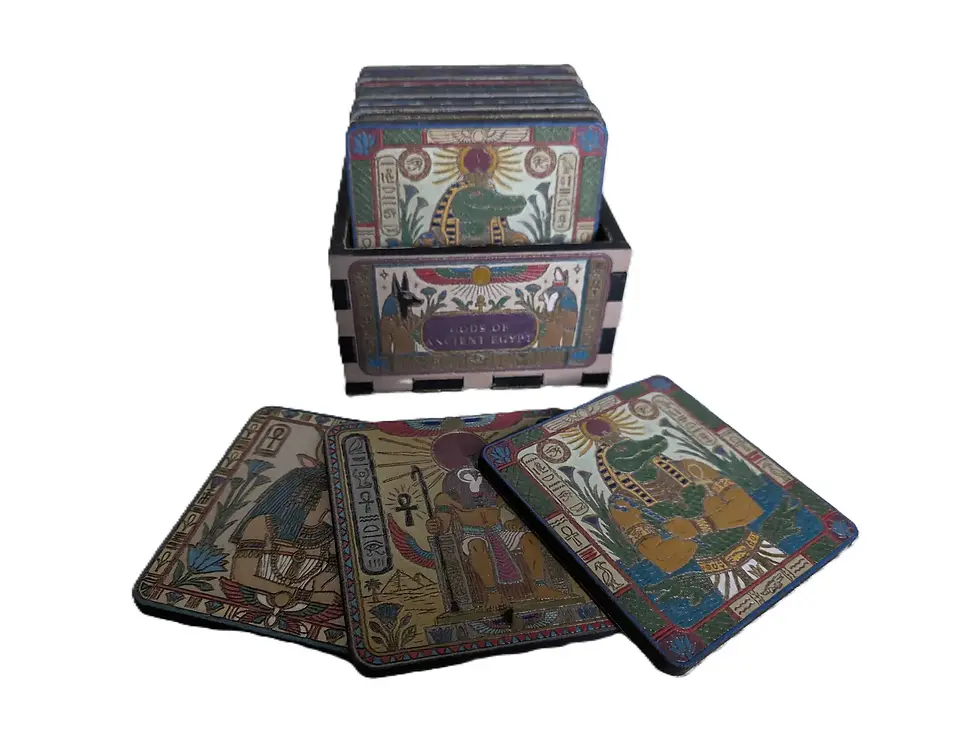 Hand-painted Ancient Egyptian Gods coasters in their matching display box, with three colourful designs arranged in front.