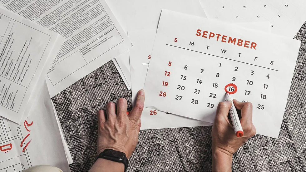 An image where somebody is marking a date with red marker