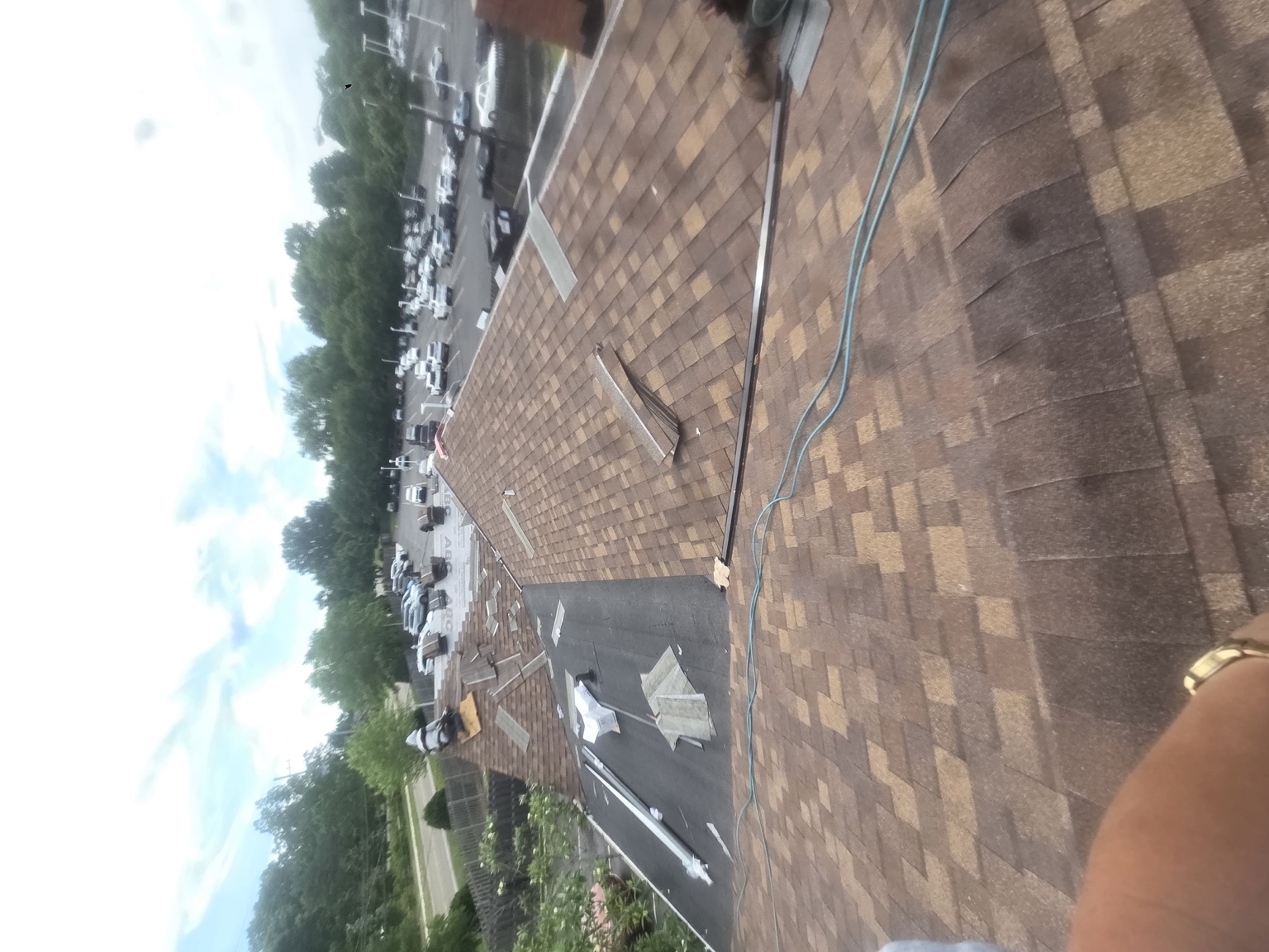 Roof slopes and adjoining low-slope section — Maverick Exteriors