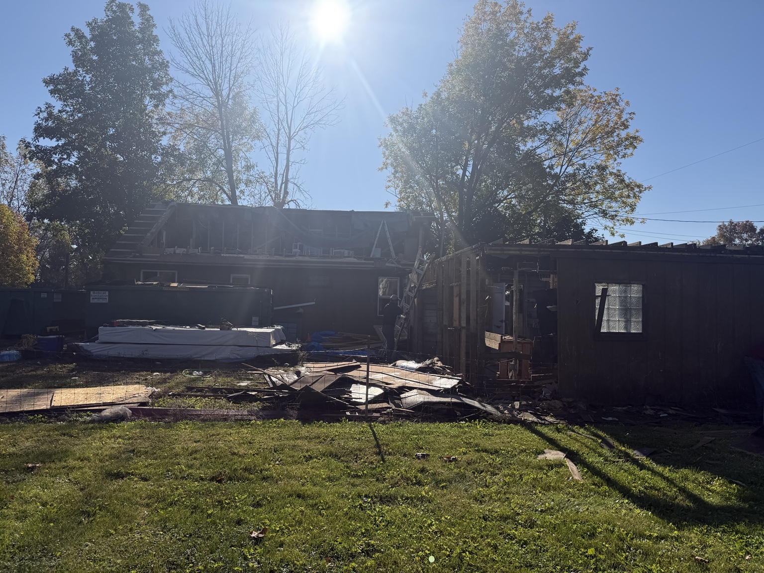 Rear view of the renovation in progress — Maverick Exteriors project