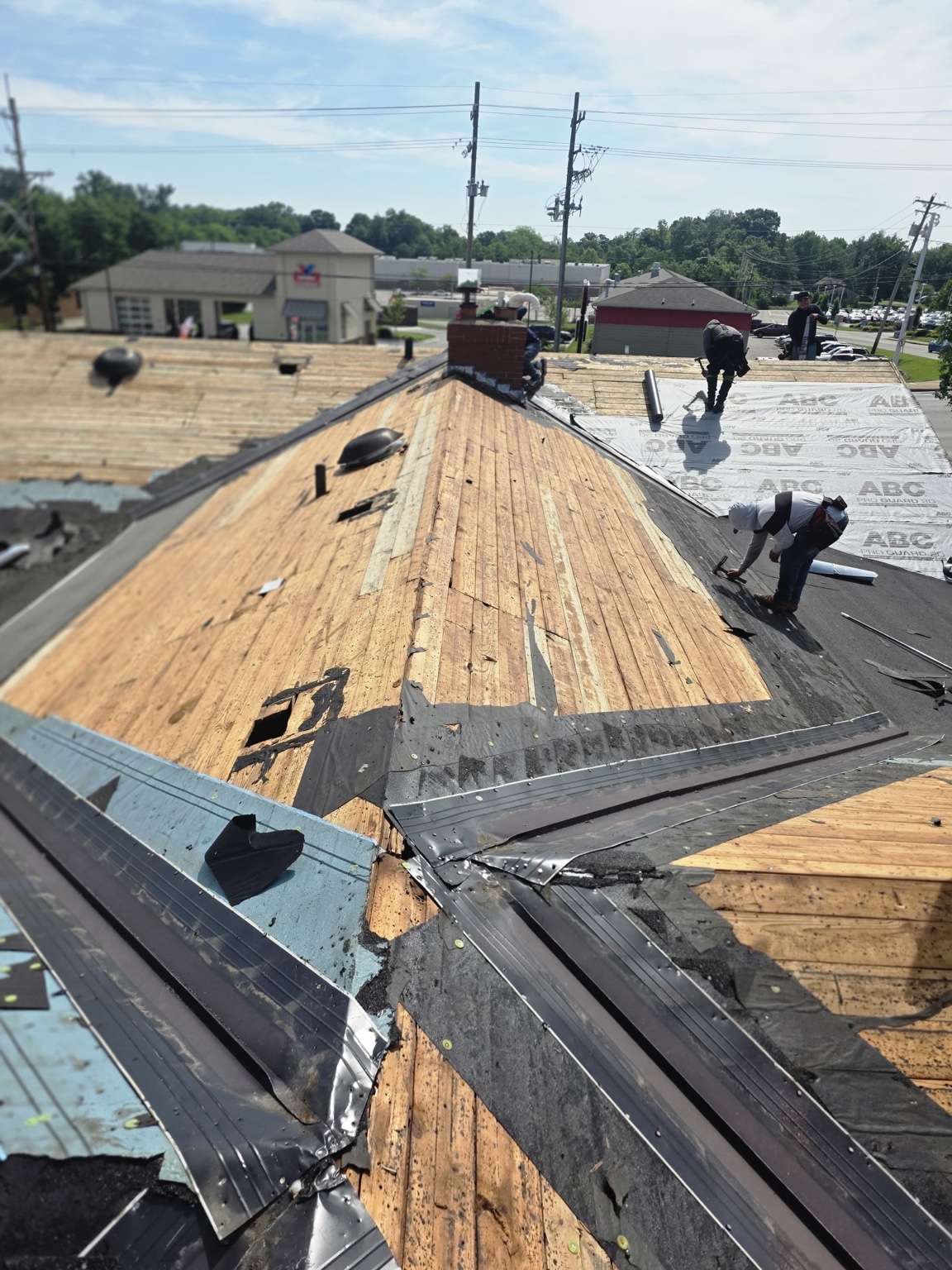 Tear-off, exposed decking, and underlayment installation — Maverick Exteriors