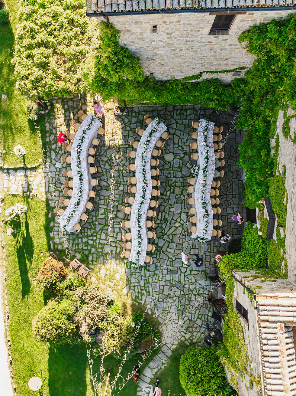outdoor wedding ceremony overlooking Assisi countryside