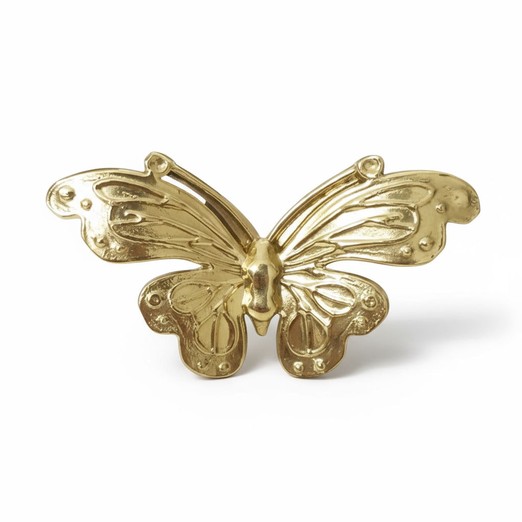 Solid brass butterfly cabinet knob with detailed wings and polished gold finish, decorative drawer handle