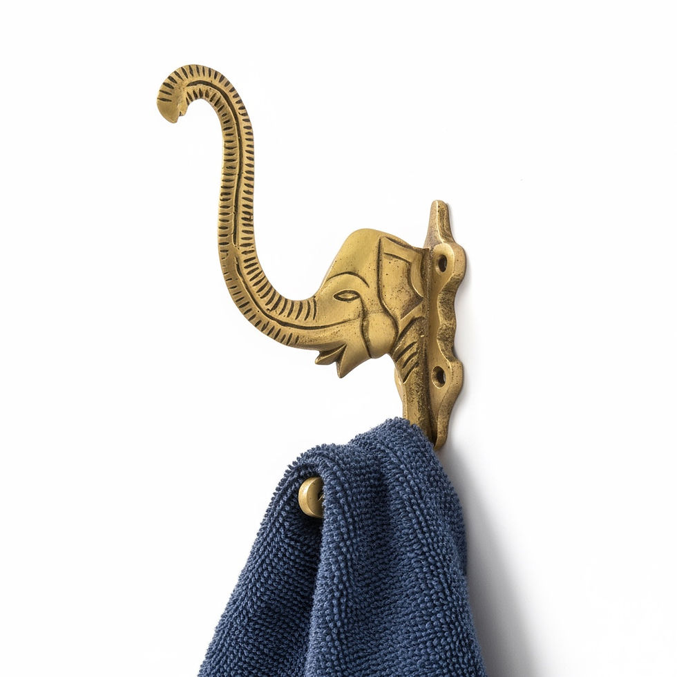 Thumbnail: Decorative brass wall hook with elephant design and two hooks holding accessories