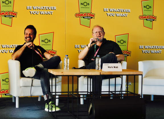 Mark Waid speaks on a panel at Comic Con in Lisbon, Portugal