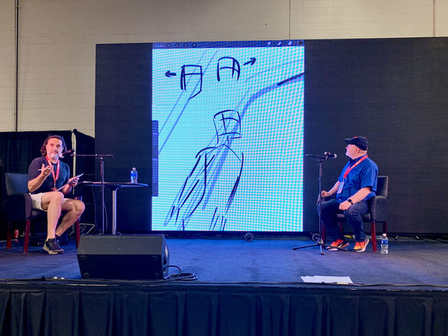 Christian Gossett and Mark Waid explain how they work together together to create comic book panels at their traveling seminar, Comic Book U