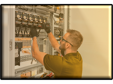 An image of an electrical worker working on a grid