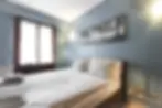 Shared worker room with beds in company housing apartment