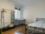 Private worker room with single bed in company housing apartment