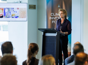 Louise presents at the 2024 Climate Investor Forum at the MCG