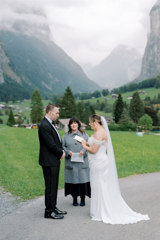 Couple eloping in the rain in Lauterbrunnen, Switzerland