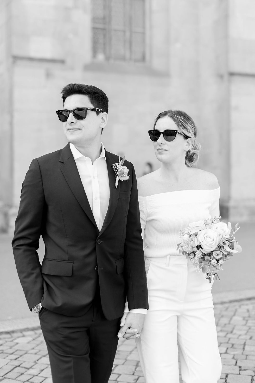 Zurich civil wedding photography. Couple in front of church