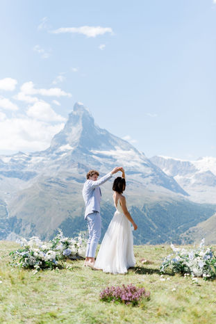 bride and groom at elopement in Zermatt, Switzerland with Matterhorn