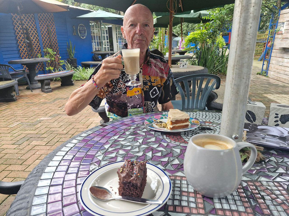 Chris enjoying coffee and cakes