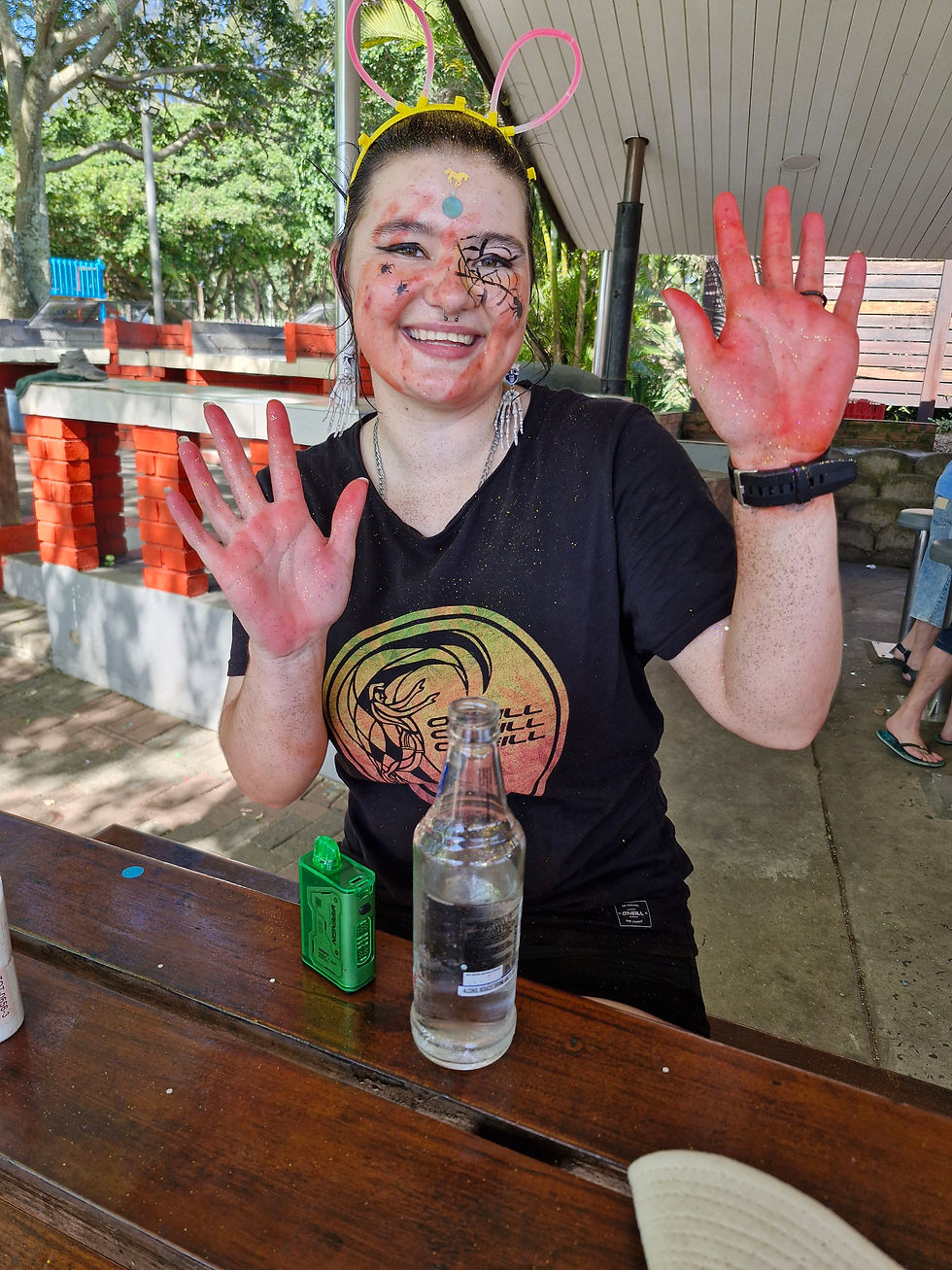 woman covered in kids face paint
