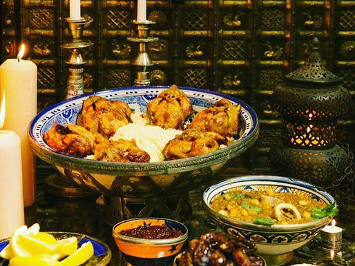 Saffron-Glazed Baby Chickens Stuffed with Couscous and Almonds.